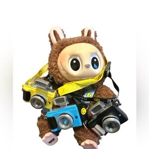 NEW Fashionable  Labubu Doll -Camera Only black or yellow or blue .